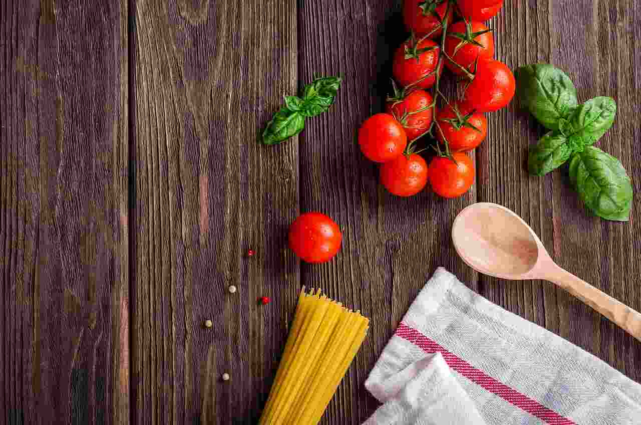 Red round tomatos with smooth table.